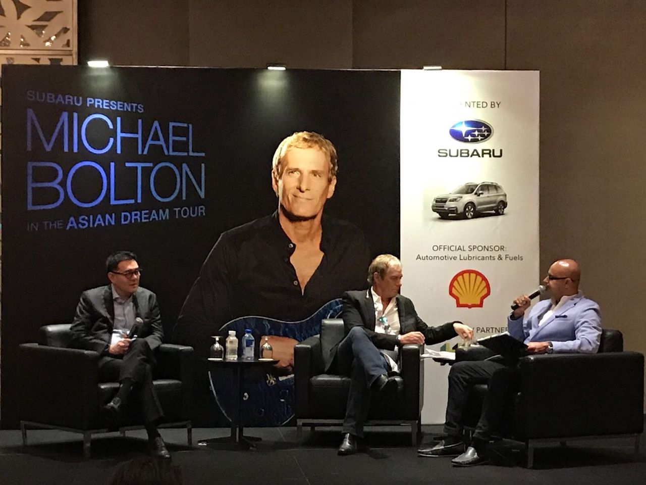 Rico Smith hosting an on-stage interview at the Michael Bolton Asian Dream Tour event