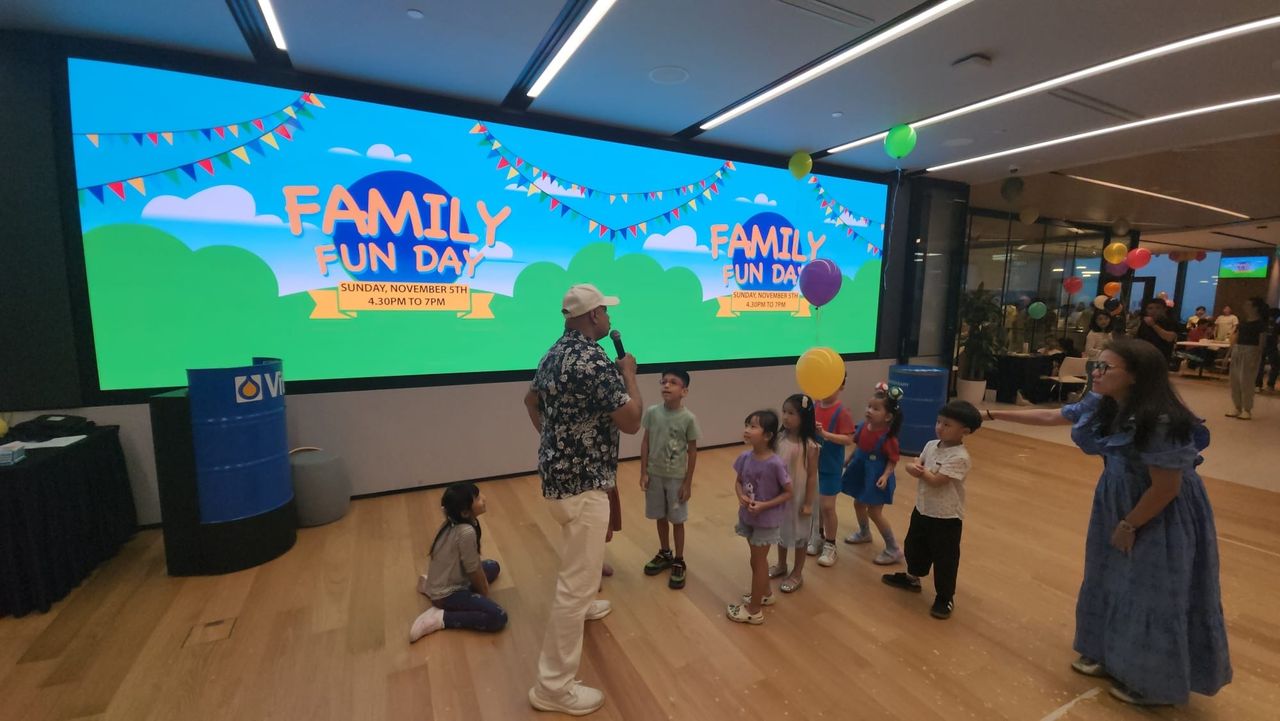 Rico Smith hosting games with children at a Family Fun Day