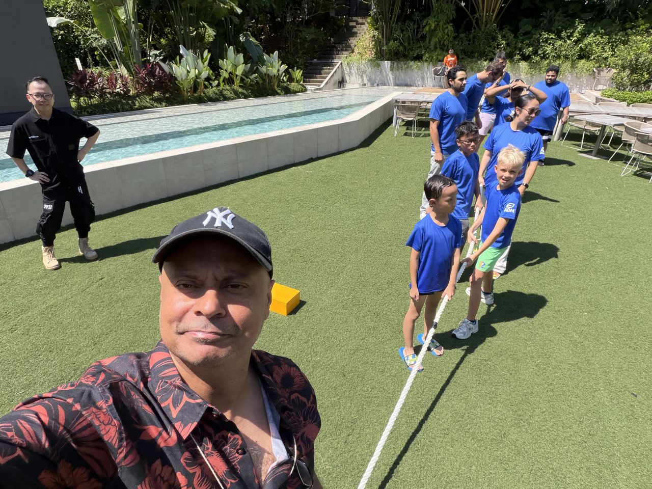 Rico Smith with kids lined up for a tug of war