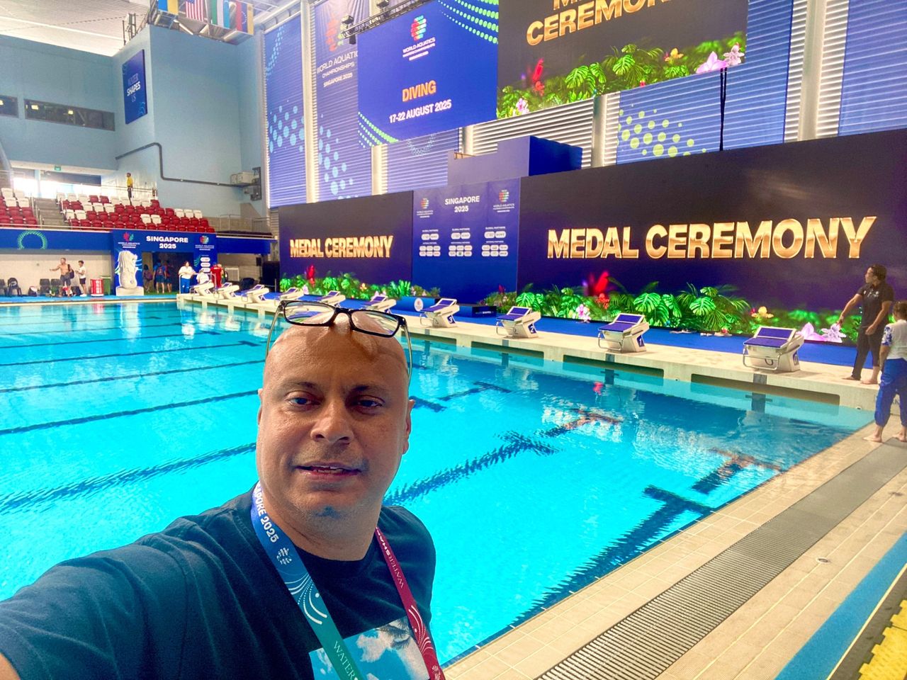 Rico Smith poolside before a medal ceremony at the World Aquatics Masters Championships