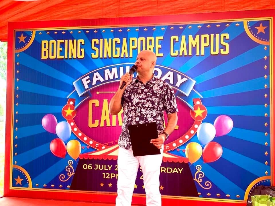 Rico Smith hosting the Boeing Singapore Campus Family Day Carnival