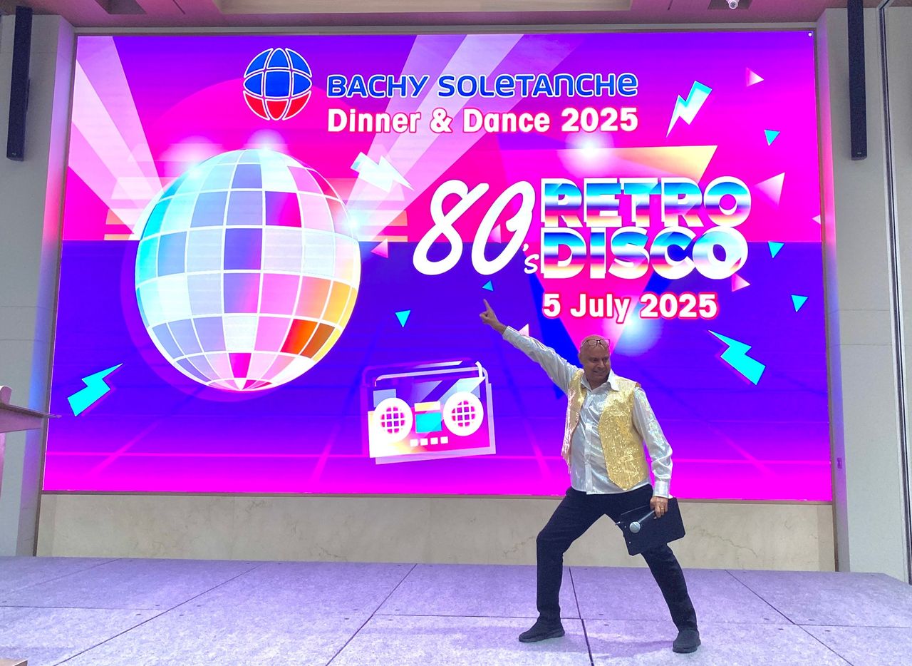Rico Smith striking a disco pose at the Bachy Soletanche 80s Retro Disco dinner and dance