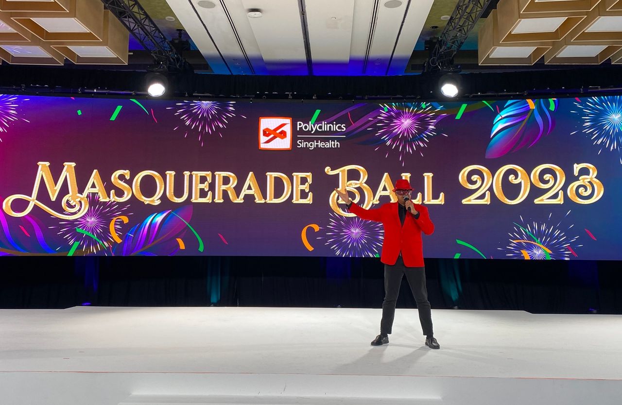 Rico Smith hosting the SingHealth Polyclinics Masquerade Ball