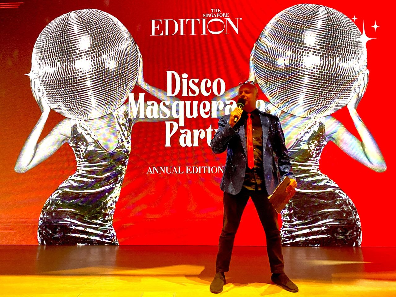Rico Smith hosting the Disco Masquerade Party at The Singapore EDITION
