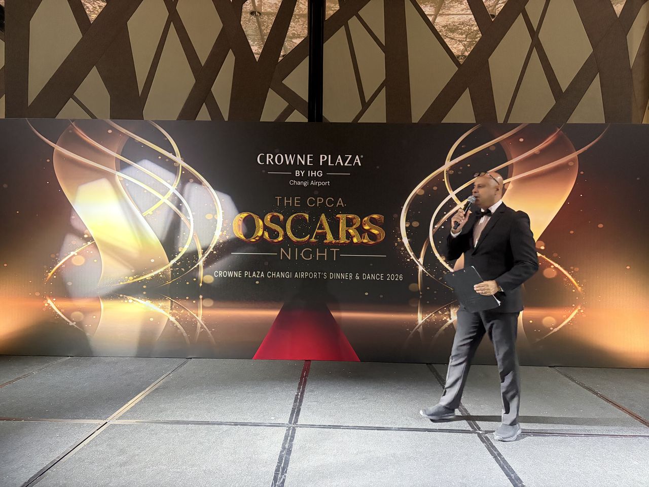 Rico Smith hosting the Crowne Plaza Changi Airport Oscars Night dinner and dance