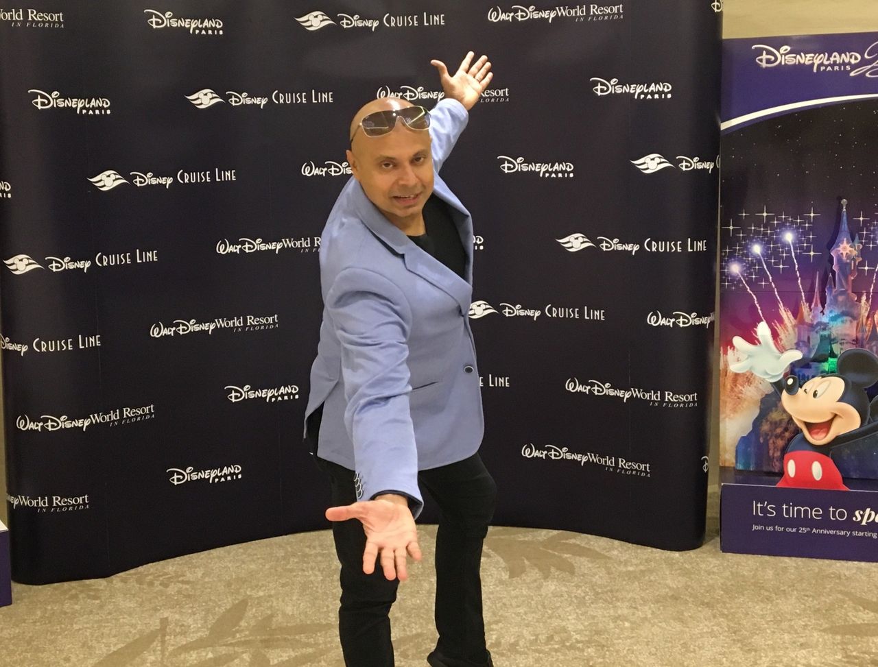 Rico Smith striking a playful pose at a Disney event